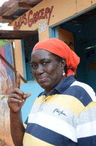Feeling a sense of victory Miss Seabourne shows off her rebuilt shop, which she constructed with the help of JN Small Business Loans (JNSBL). The JNSBL client’s home and shop were destroyed by fire in September.  