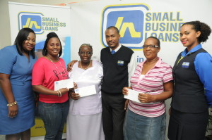 Credit Relations Officers Latoya Hayden-Cousins (left), Howard Clarke (centre) and Racquel Powell (right); pose with Jheannell Miller (second left), Sally Barrett (third left) and Winsome Simpson (second right) at the presentation of cheques to the winners of the Ready, Set, Repay Promotions at the JNSBL offices on Duke Street, Kingston recently. Miller won first prize while Barrett and Simpson Finished second and third respectively. The Ready, Set, Repay promotions competition rewarded clients who paid their loans on time between October 1 2013 and March 31, 2014. The top three winners were randomly selected, by way of a draw.